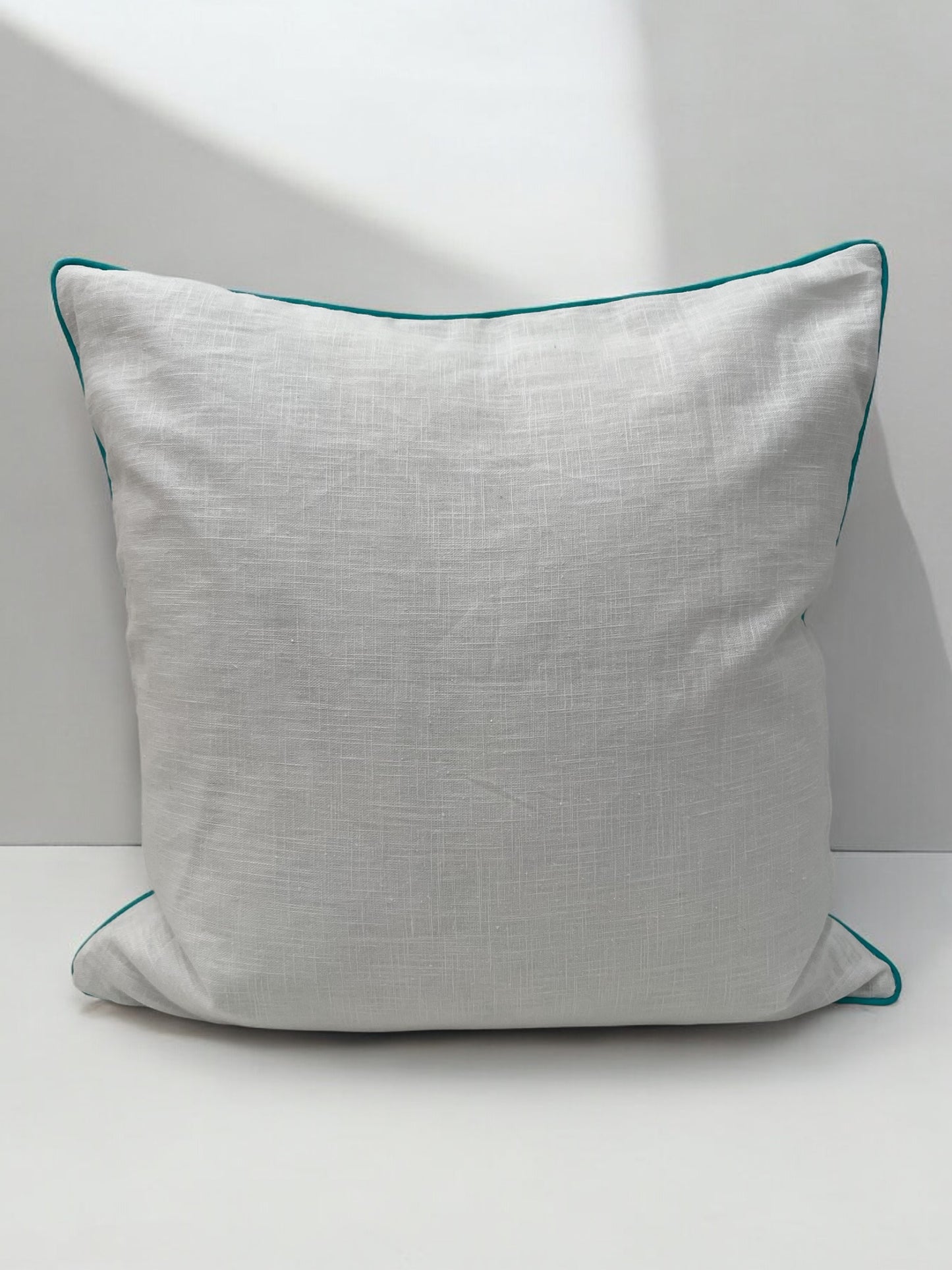 AMALFI cushion cover with turquoise trim