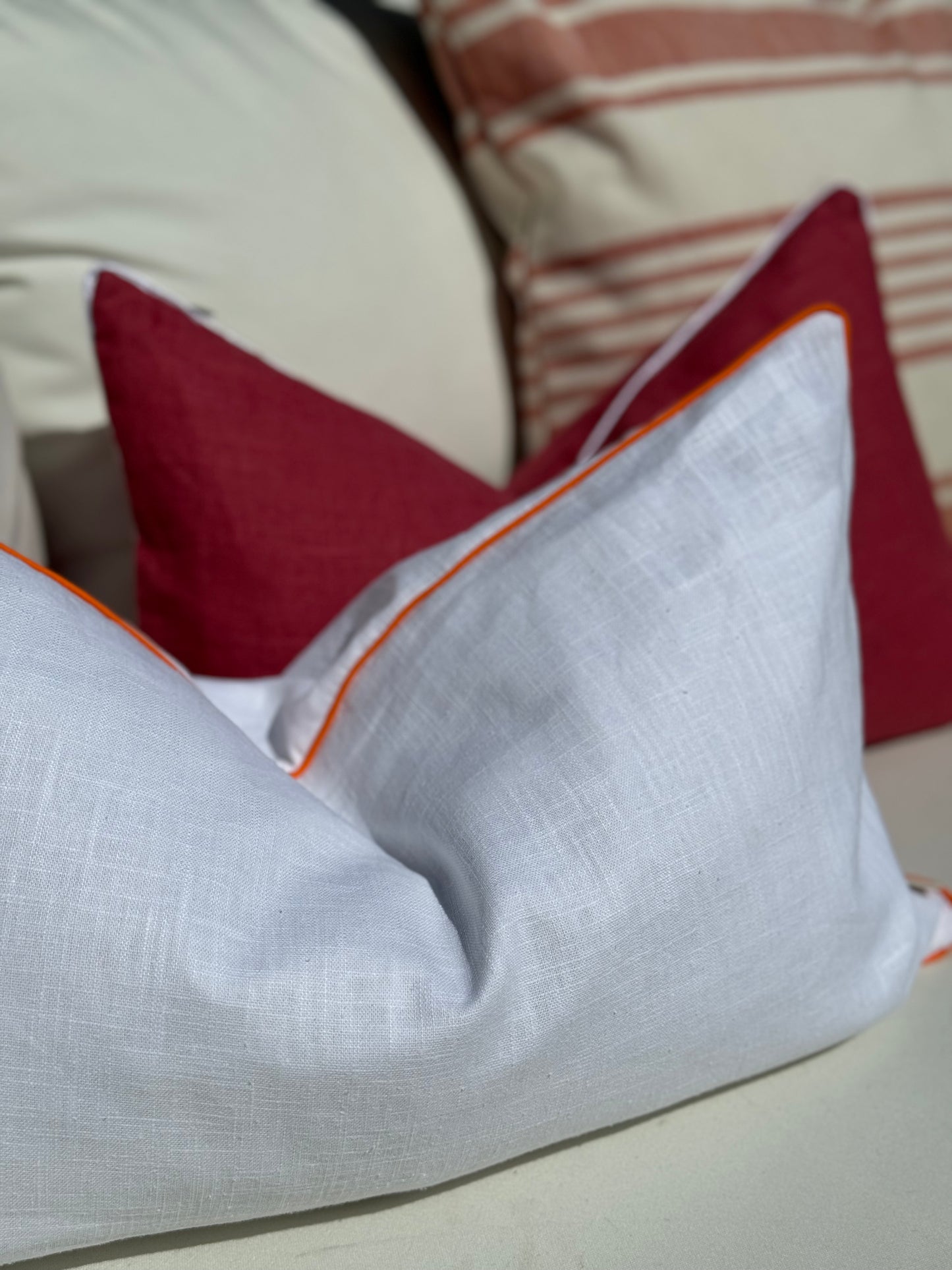 AMALFI cushion cover with orange trim